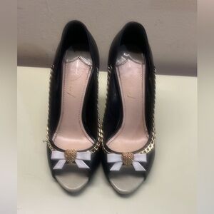 Elegant Black and Gold Peep-Toe Heels